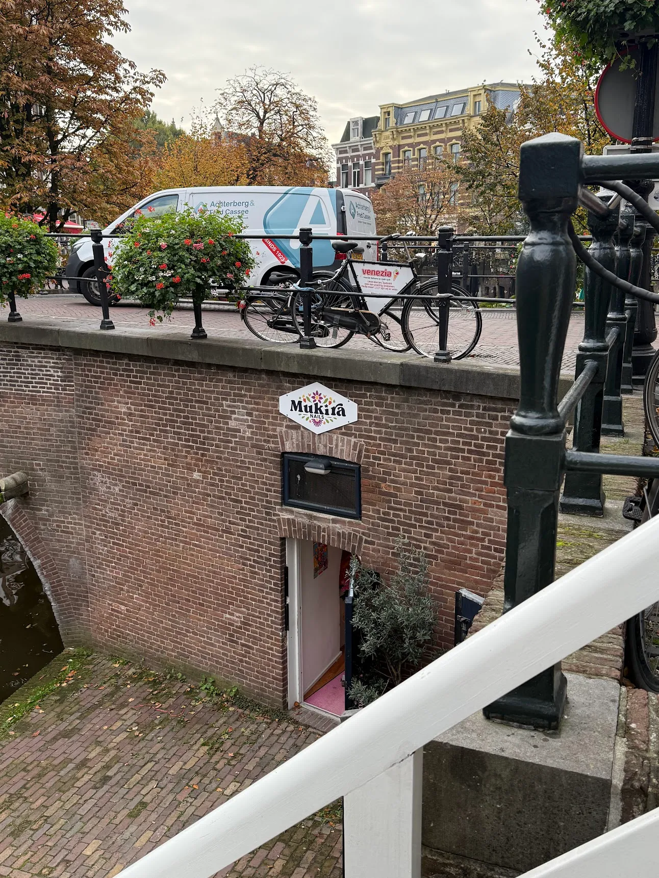The studio doorway below the street, seen from the Oudegracht bridge